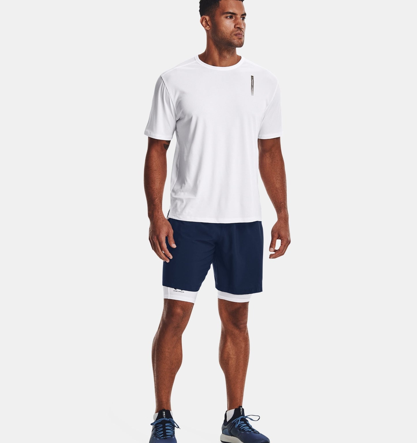 UNDER ARMOUR MENS WOVEN GRAPHIC SHORTS - ACADEMY